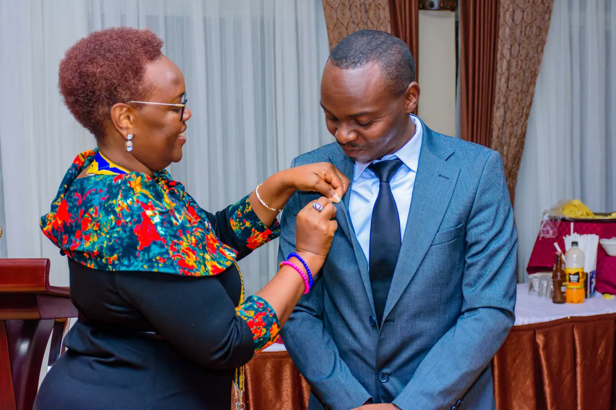 A member being collared at a club induction ceremony
