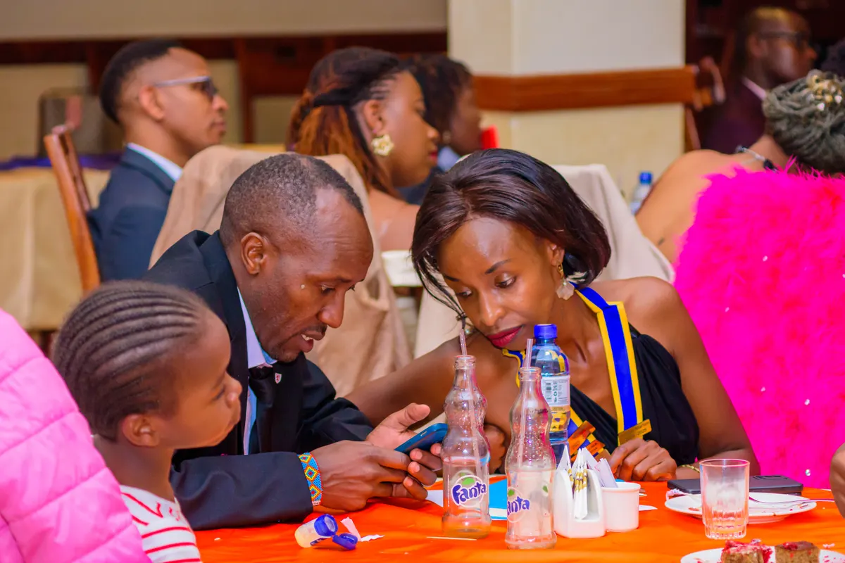Members and guests talking together at a club function